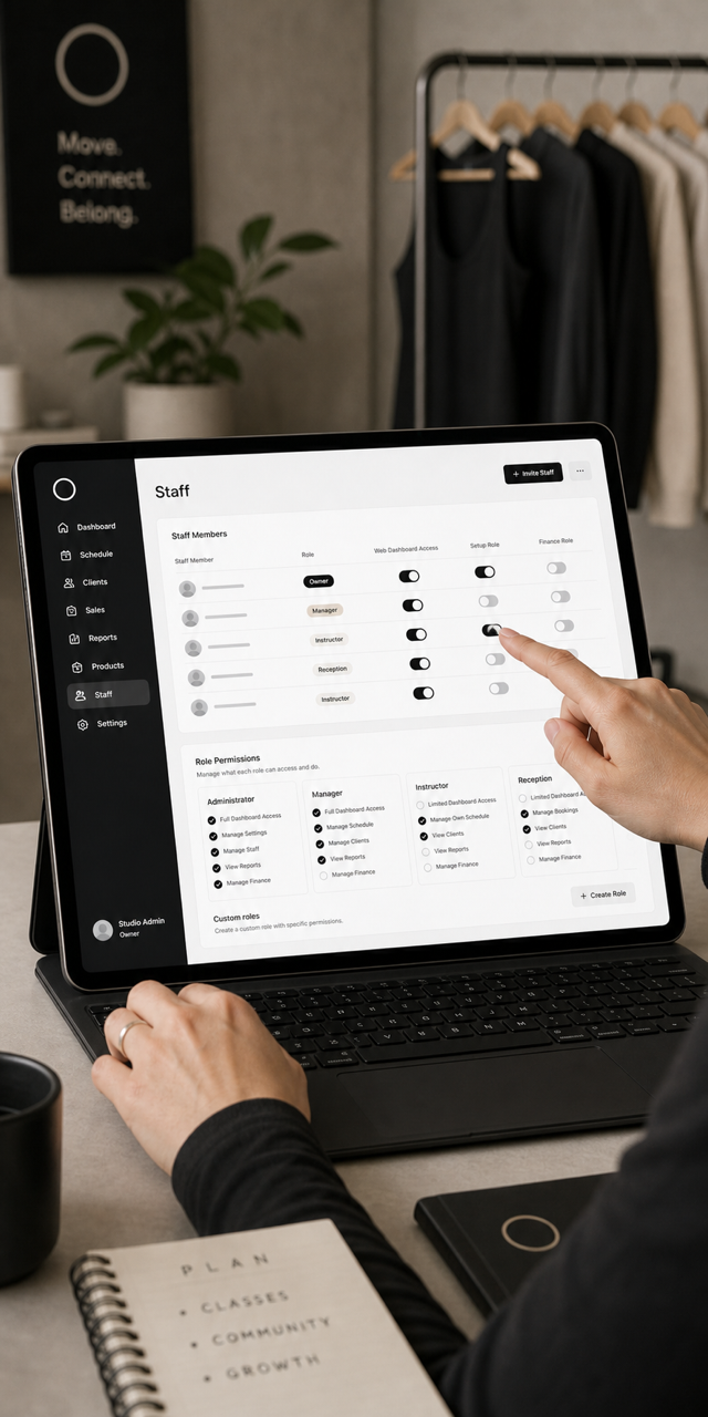 Studio owner managing staff roles and dashboard access in Clovo